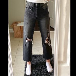 Straight leg high rise black ripped jeans